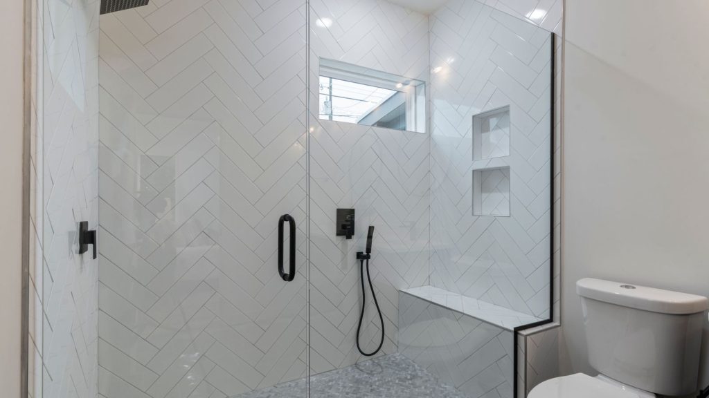Modern bathroom with sleek curbless walk in shower
