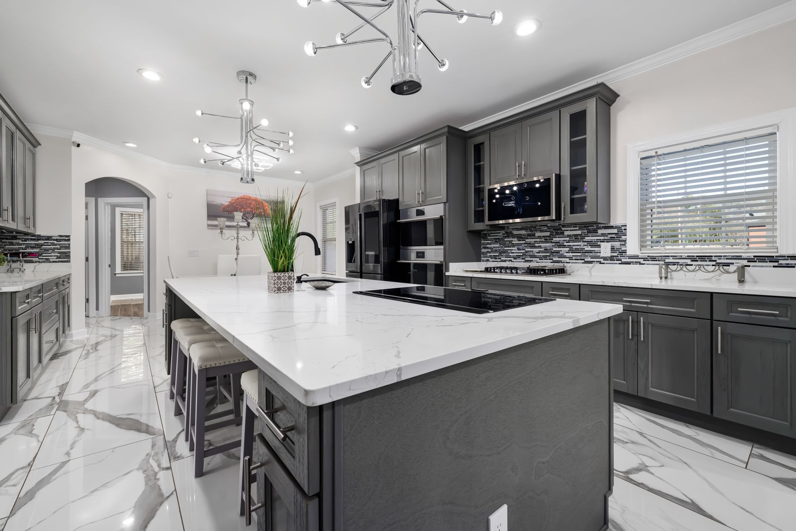 Luxury modern kitchen with marble countertops and sleek cabinetry