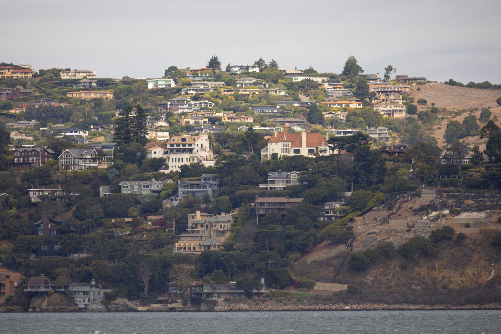Hillside homes stacked above San Francisco Bay