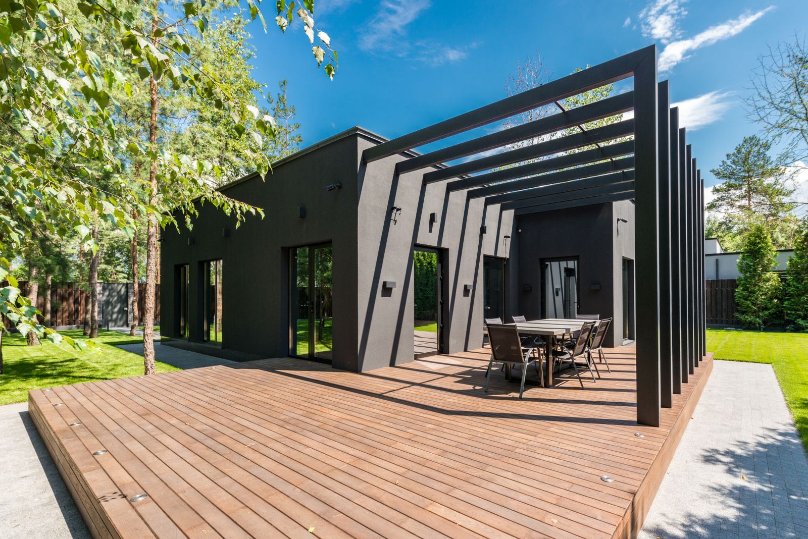 The Composite Deck: Paying Extra to Never Sand Again, and What the Market Repays