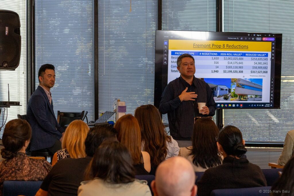 Phong La with his slide of Fremont's Prop 8 reductions on preliminary 2026 figures: 1,940 properties, 1,610 of them residential.
